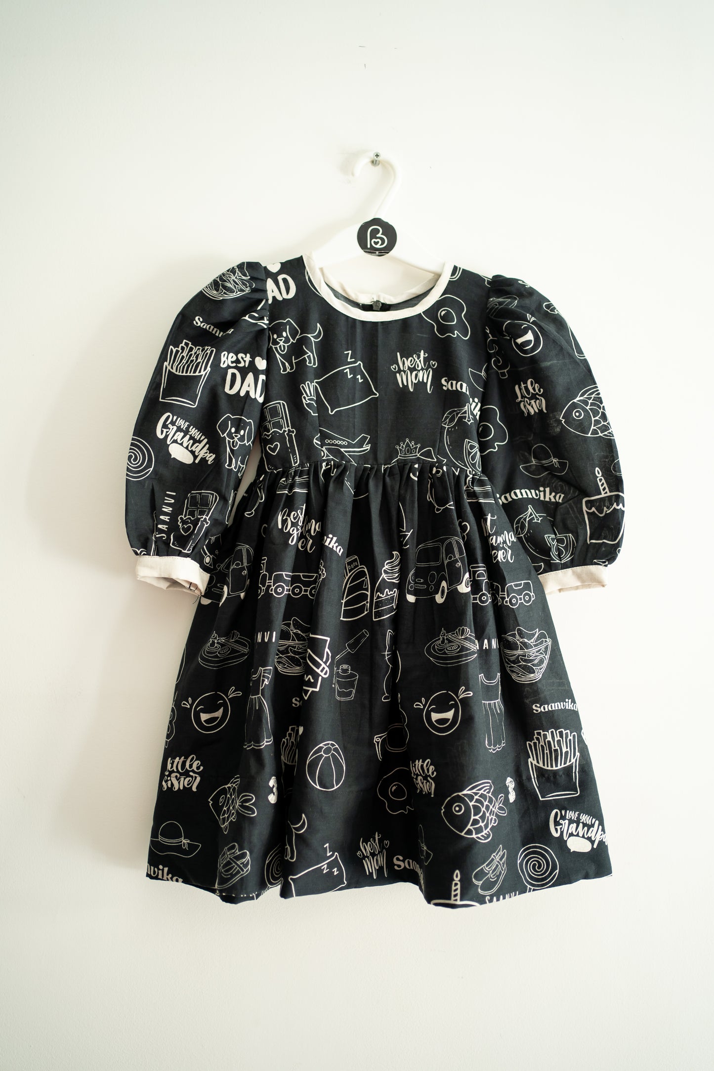 Bhavika Devarapalli Cotton frock, Floral print, Designer cotton frock, birthday theme, kids printed frocks, Best designer kids frock, top Indian Designer kids collection, Best Designer collection, black and white printed frock, doodles dress, doodles frock.