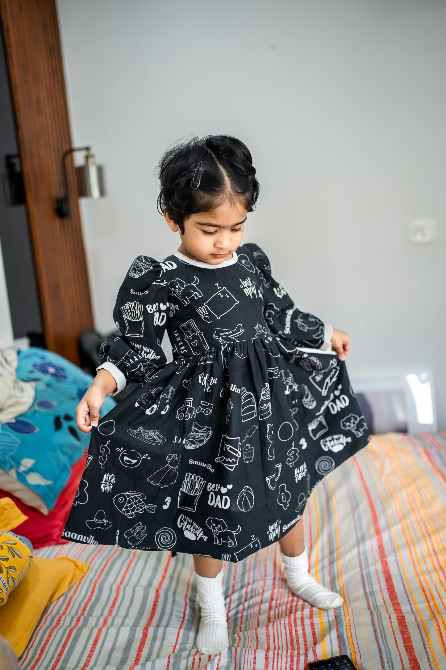 Bhavika Devarapalli Cotton frock, Floral print, Designer cotton frock, birthday theme, kids printed frocks, Best designer kids frock, top Indian Designer kids collection, Best Designer collection, black and white printed frock, doodles dress, doodles frock.