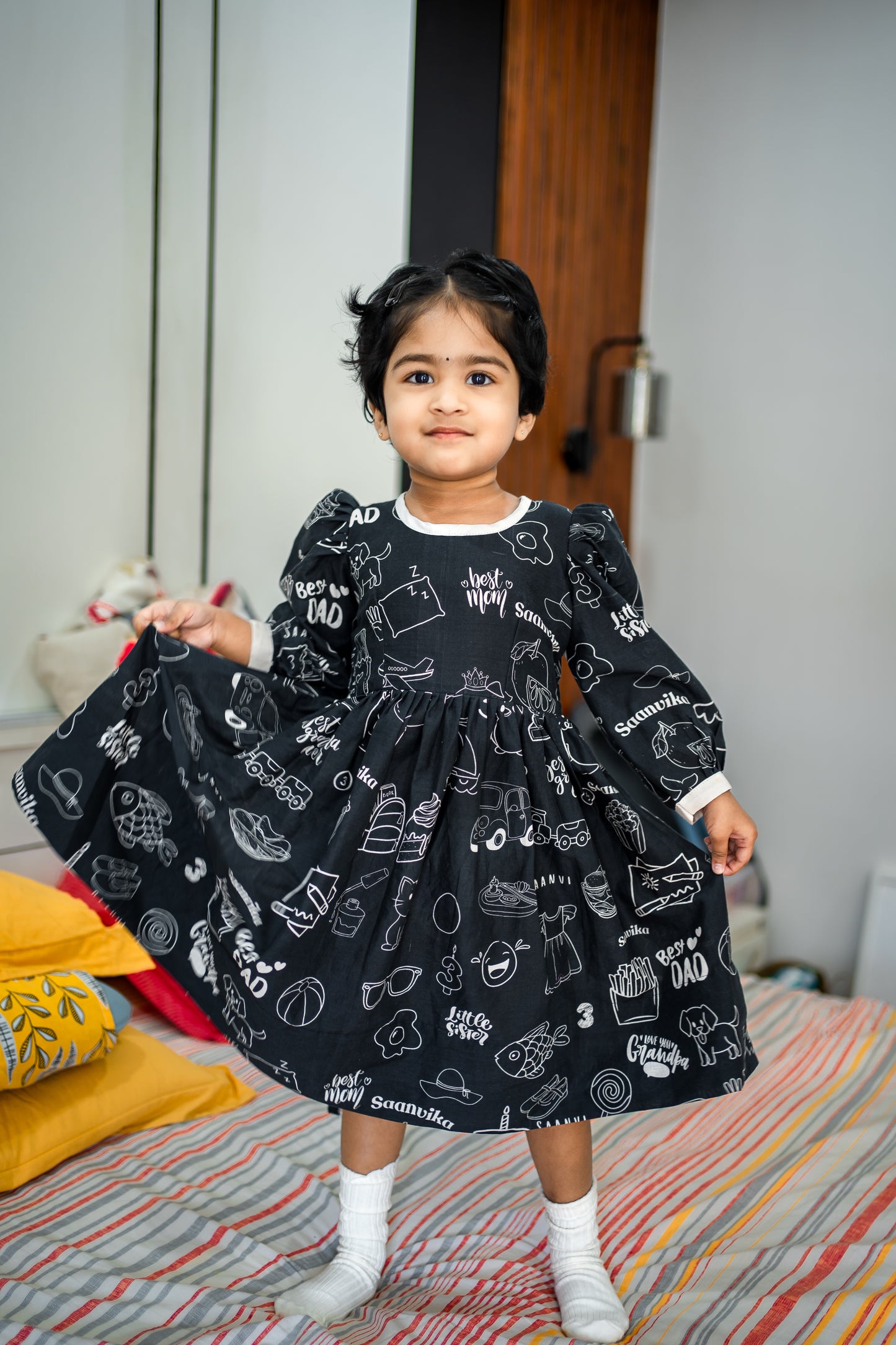 Bhavika Devarapalli Cotton frock, Floral print, Designer cotton frock, birthday theme, kids printed frocks, Best designer kids frock, top Indian Designer kids collection, Best Designer collection, black and white printed frock, doodles dress, doodles frock.